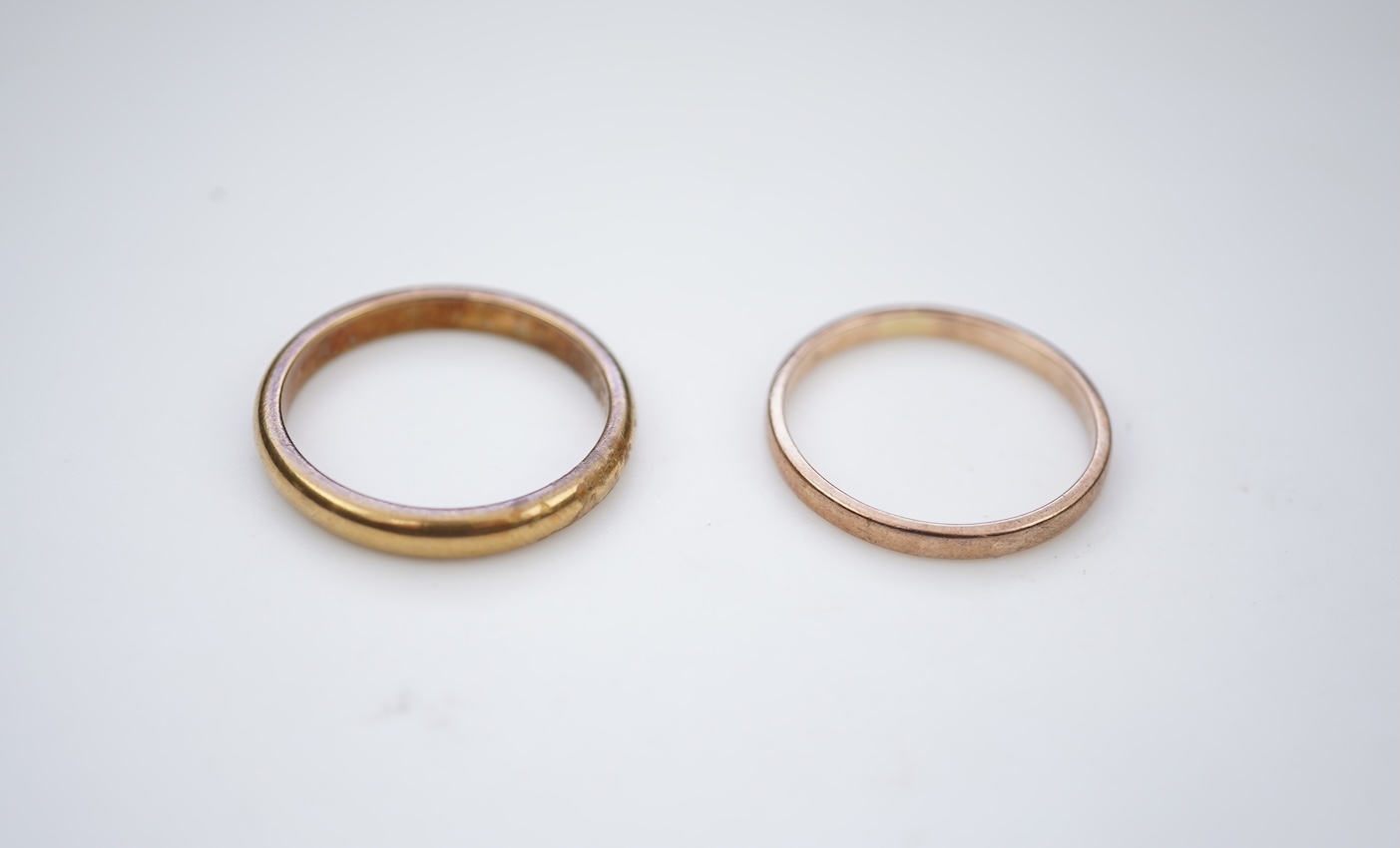 Two gold wedding bands